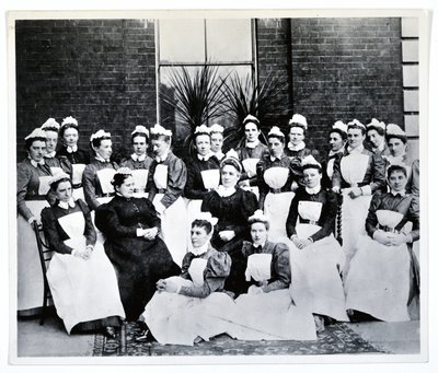 Miss Gordon, Miss Crossland and twenty nurses and sisters by English Photographer